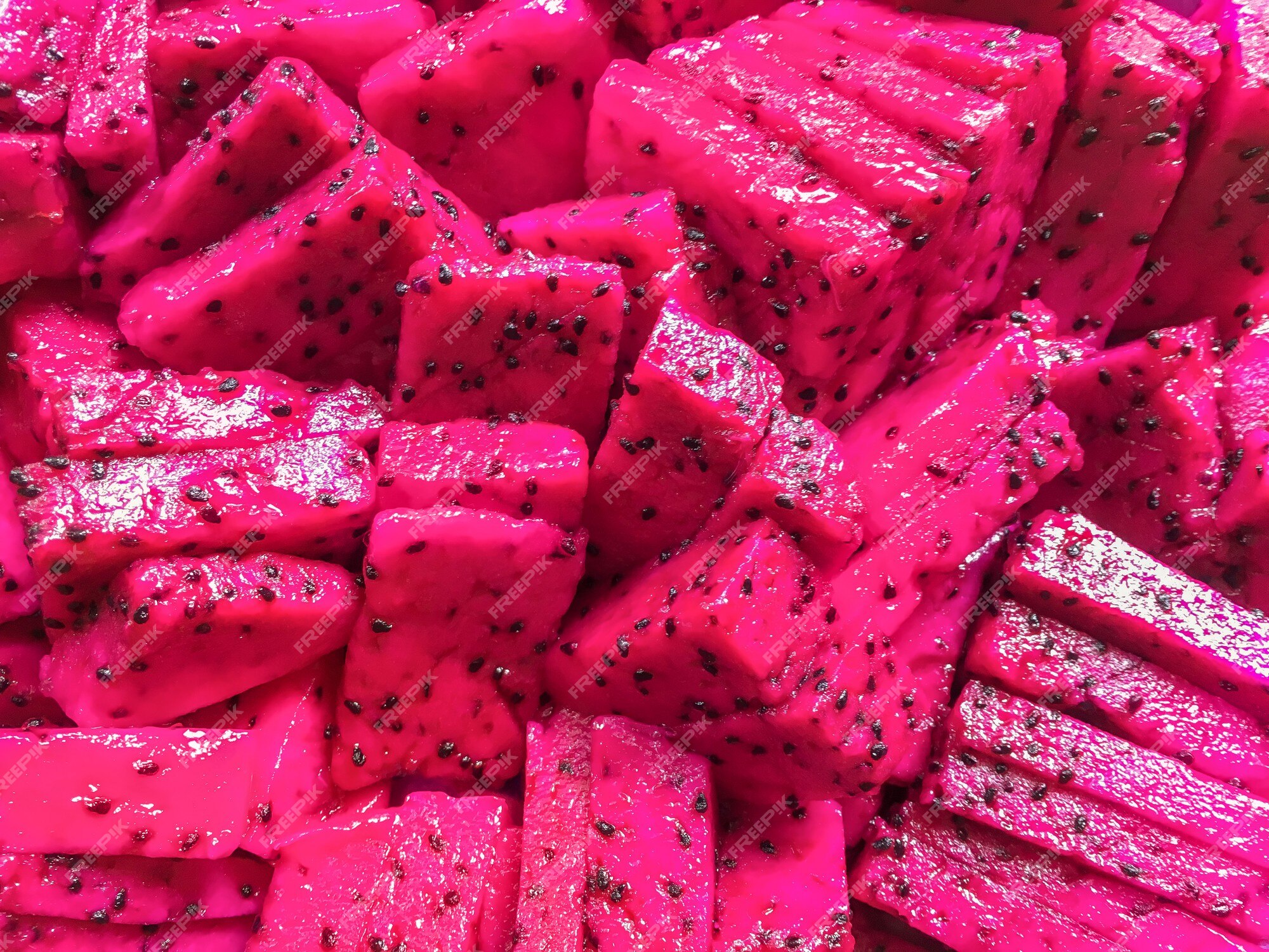 Premium Photo | Ripe juicy sliced of pink pitaya. tropical dragon fruit  background.