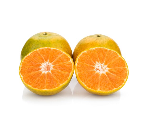 Ripe juicy tangerine on a white surface