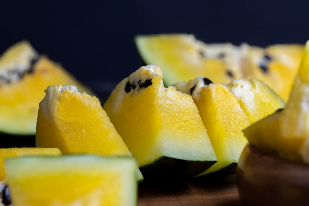 Ripe and juicy yellow watermelon cut into pieces