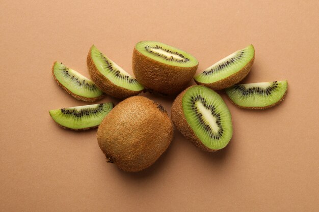 Ripe kiwi on craft brown surface