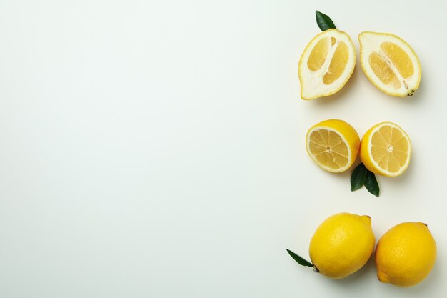 Ripe lemons on white