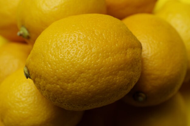 Ripe lemons on whole, close up