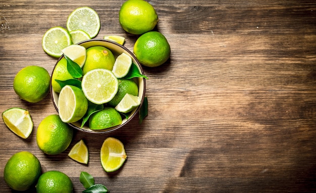 Ripe limes in a bowl.