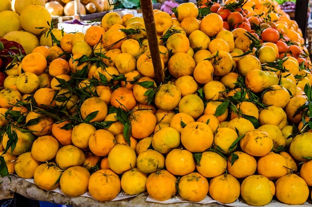 Ripe mandarins for sale on a fruit market