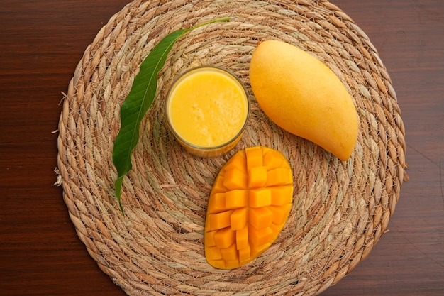 Ripe mango on woodRipe Mango Slice on wooden cutting board