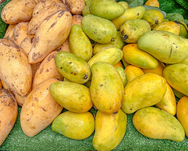 Ripe mangos on a fruit stall