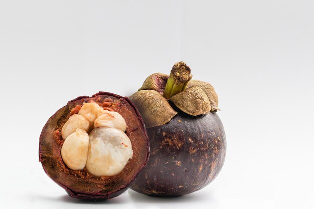 ripe mangosteen isolated on white background.