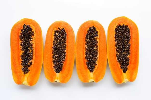 Ripe papaya fruit on white background.