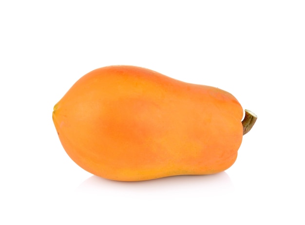 Ripe papaya fruit on white wall