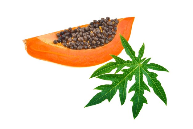 Ripe papaya with leaf on white background