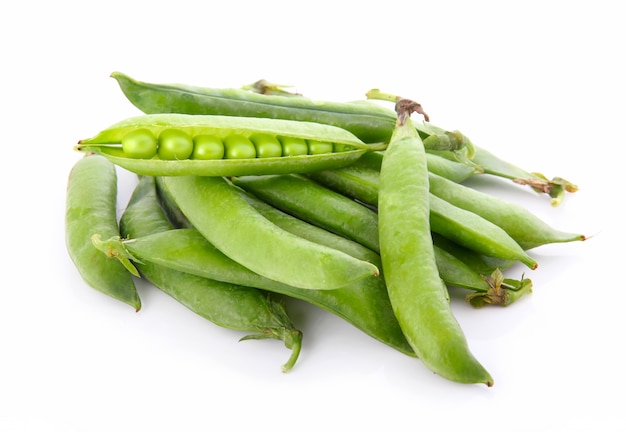 Ripe pea vegetable with green leaf isolated