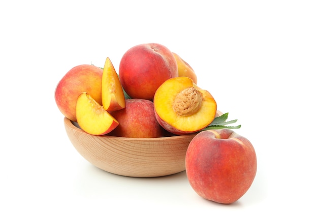 Ripe peach fruits isolated on white background