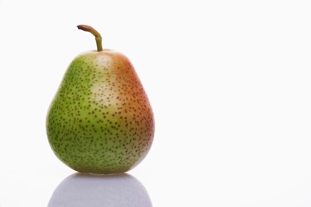 ripe pear on a white background