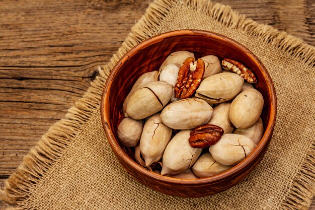 Ripe pecan on vintage wooden table