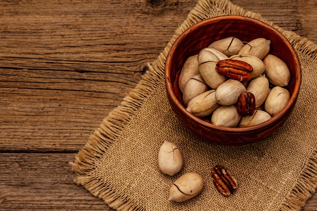 Ripe pecan on vintage wooden table