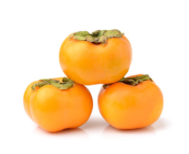 Photo ripe persimmons isolated on white space