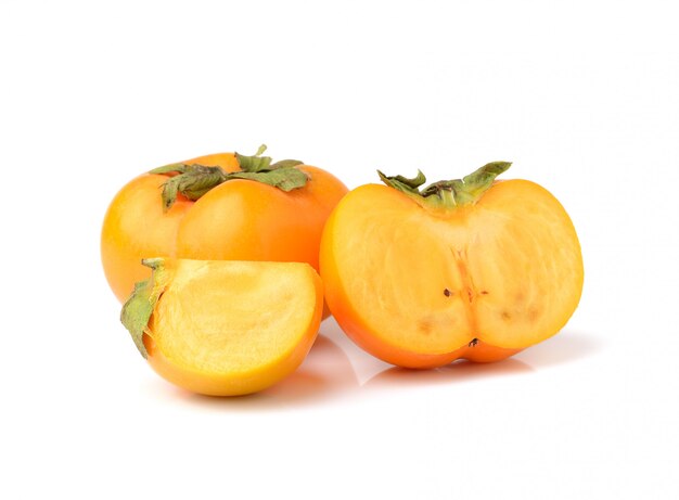 Ripe persimmons isolated on white space