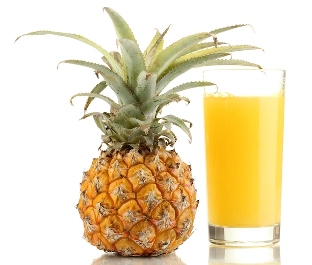 Ripe pineapple and juice glass isolated on white