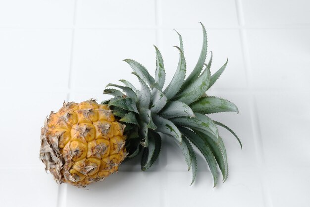 A ripe pineapple Nanas Madu on a white background Selective focus image