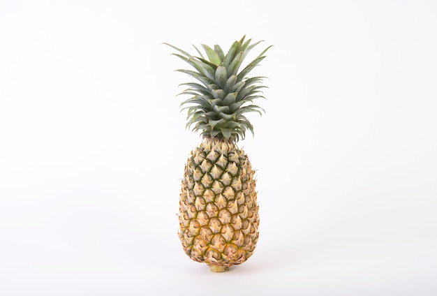 Ripe pineapple on white background