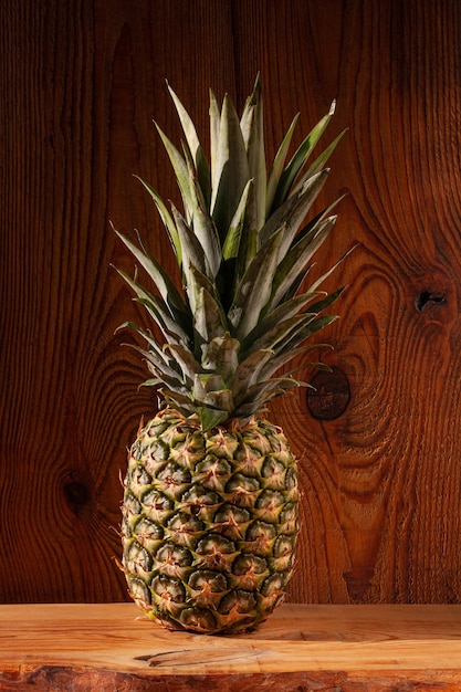 Ripe pineapple on wooden background Healthy food ingredients tropical fruits diet slimming vegan foods weight loss