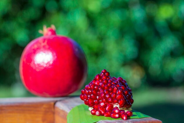 Ripe pomegranate fruit segment Organic fresh red garnet close up