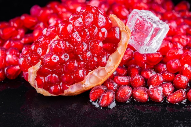 Ripe pomegranate fruits on the wooden