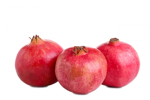 Ripe pomegranates isolated on a white background