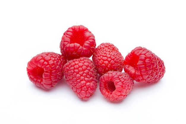 Ripe raspberries isolated on white.