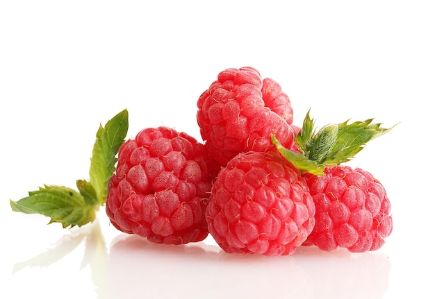 Ripe raspberries with mint isolated on white