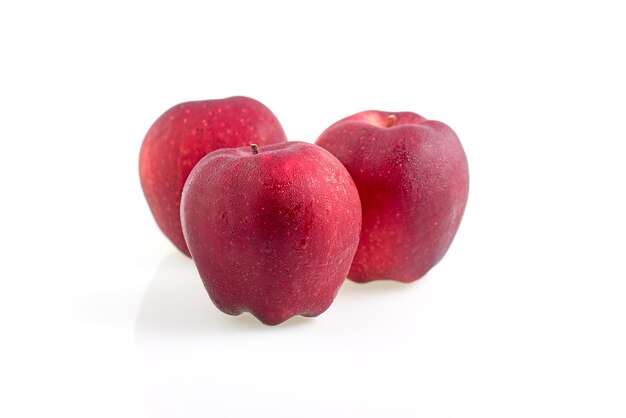 Ripe red apples isolated on a white background