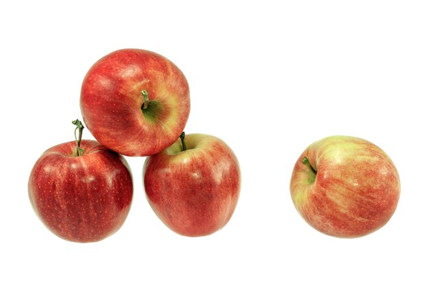 Ripe red apples on a white background