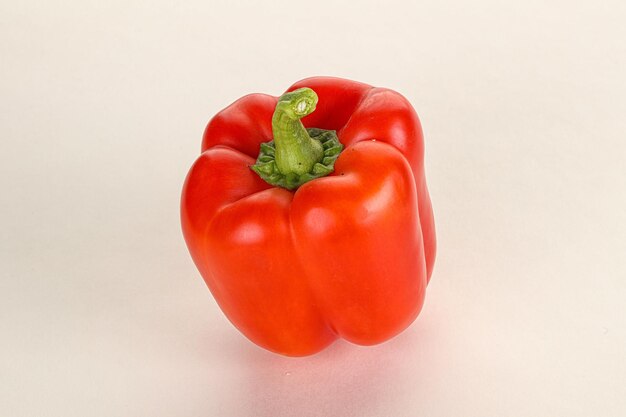 Ripe red Bulgarian bell pepper isolated