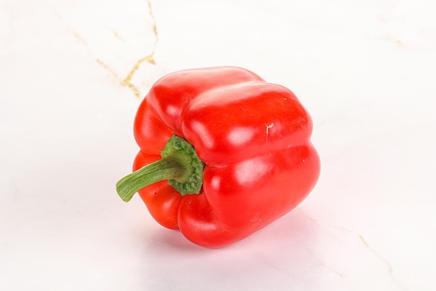 Ripe red Bulgarian bell pepper isolated