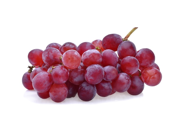 Ripe red grape isolated on white surface