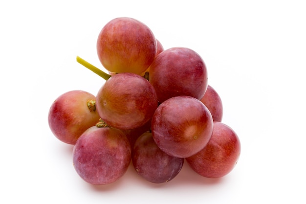 Ripe red grape isolated on white.