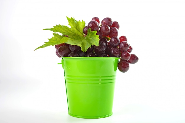 Ripe red grapes with leaves 