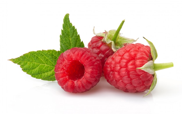 Ripe red raspberries isolated on white