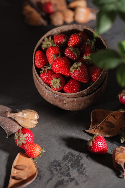 Ripe red strawberries in the bowl