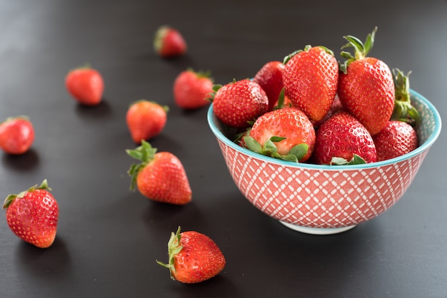 Ripe red strawberries in a bowl