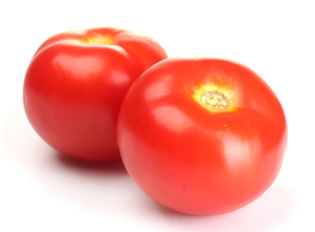 Ripe red tomatoes isolated on white