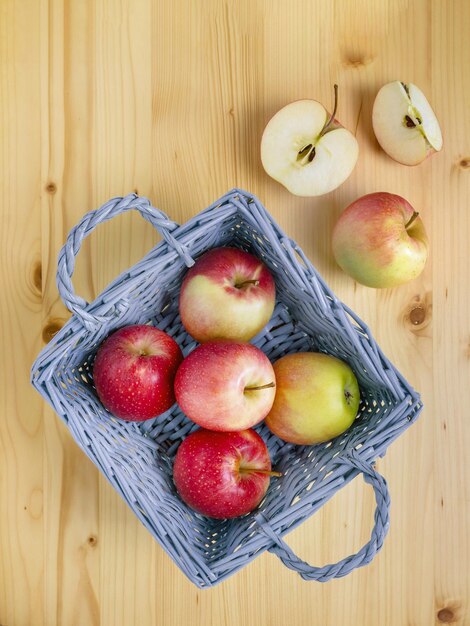 Ripe red and yellow apples in a basket