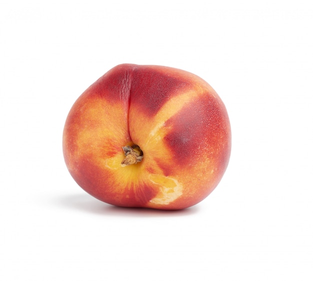 Ripe round  nectarine isolated on white background, tasty and healthy fruit