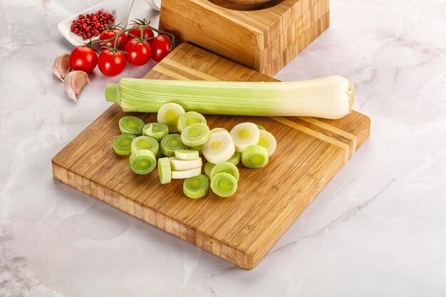 Ripe sliced leek over board