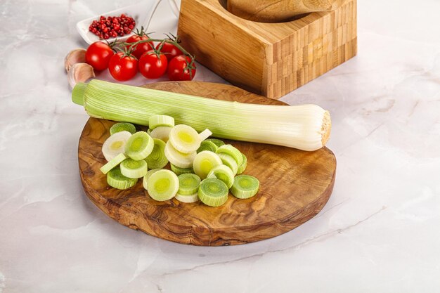 Ripe sliced leek over board