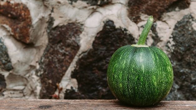 Ripe small farmer ecologically clean pumpkins of different varieties