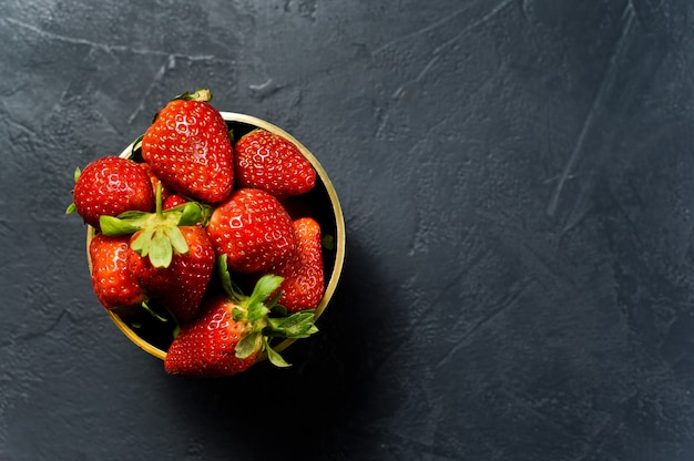 Ripe strawberries in a Golden bowl. 