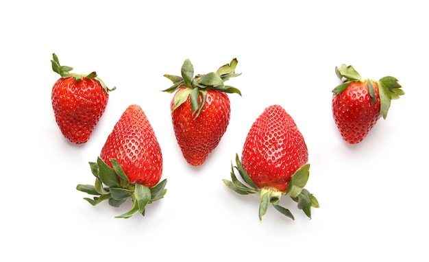 Ripe strawberries isolated on white background top view