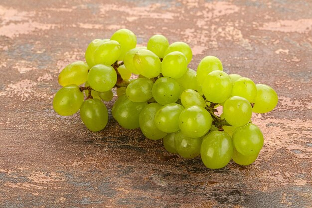 Ripe sweet green grape branch