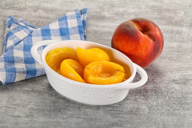 Ripe sweet and juicy canned peach dessert